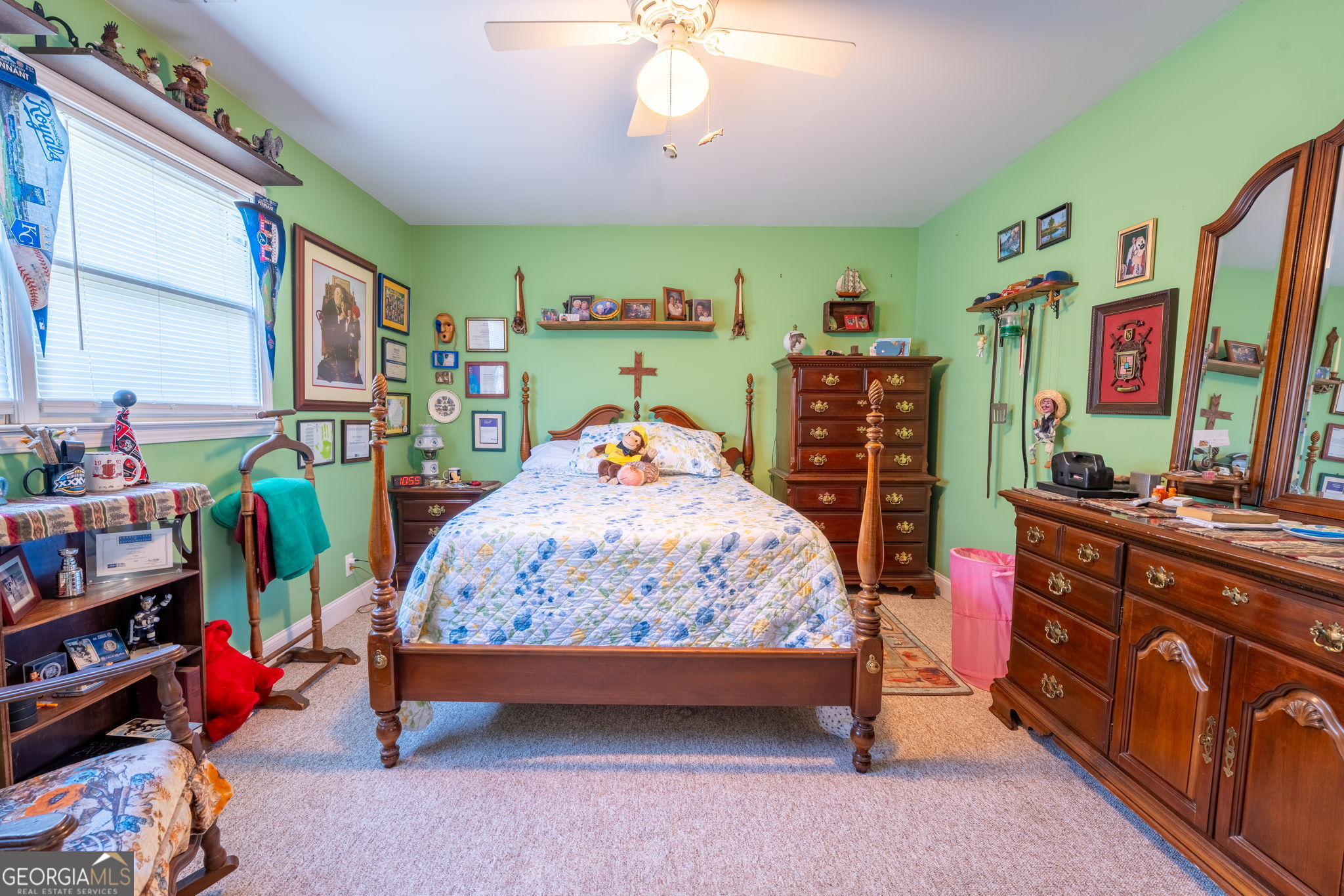 50 Green Hill Place Toccoa, GA 30577 - Photo 28 of 38 a bedroom with a bed a bookshelf and a window