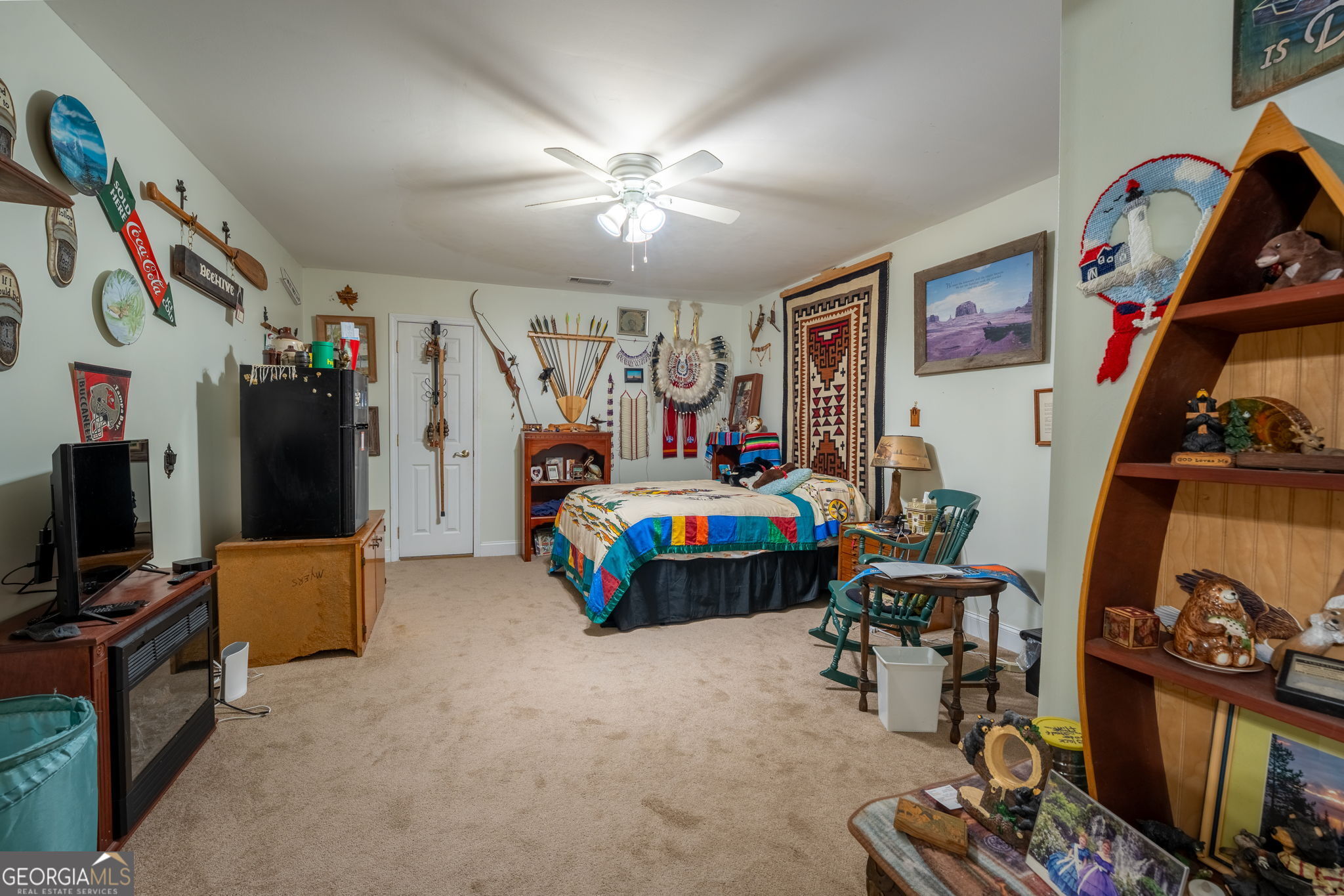 50 Green Hill Place Toccoa, GA 30577 - Photo 31 of 38 a bedroom with furniture and a gym equipment