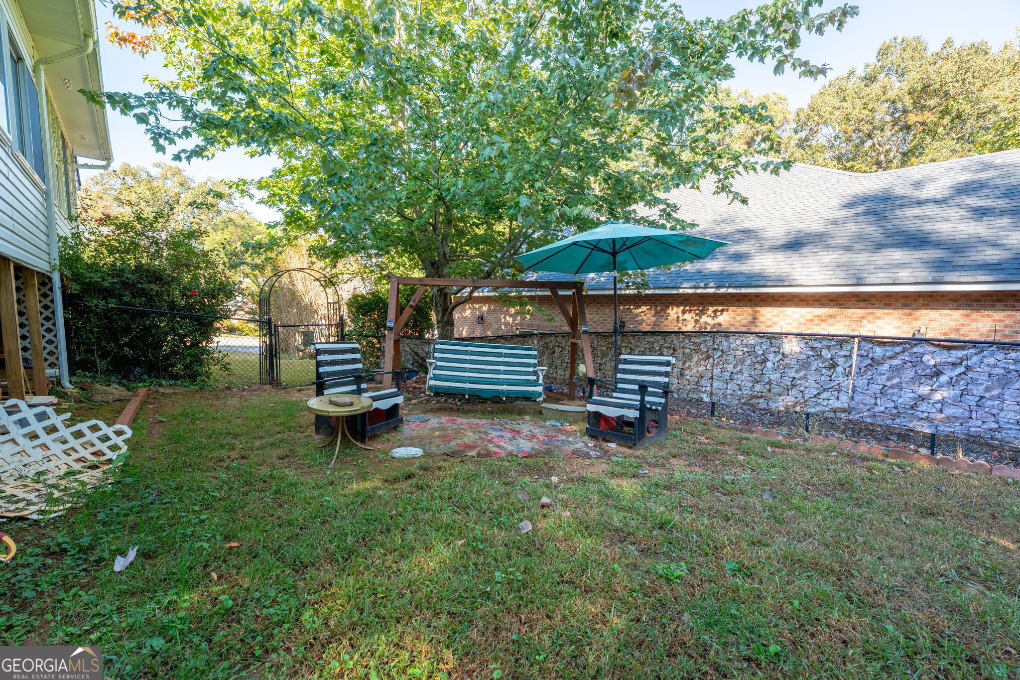 50 Green Hill Place Toccoa, GA 30577 - Photo 37 of 38 a view of a backyard with sitting area