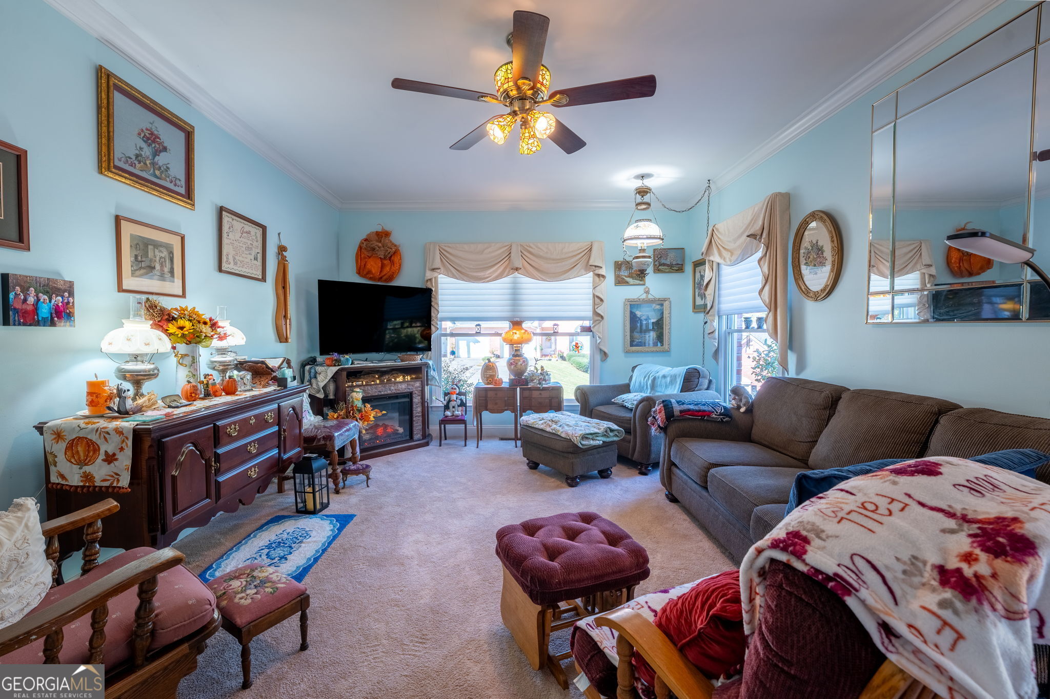 50 Green Hill Place Toccoa, GA 30577 - Photo 6 of 38 a living room with furniture kitchen view and a flat screen tv