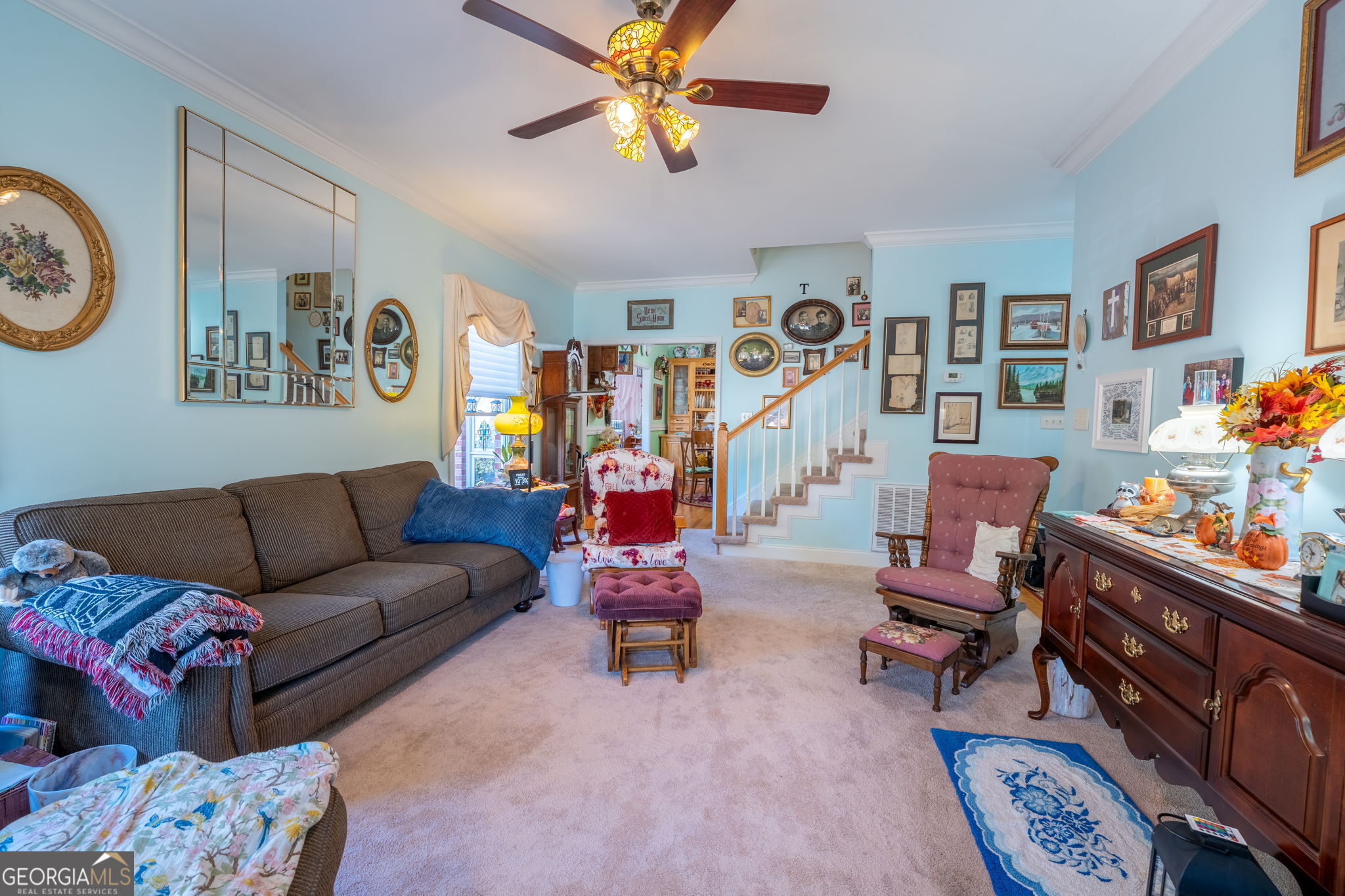50 Green Hill Place Toccoa, GA 30577 - Photo 7 of 38 a living room with furniture and paintings on the wall