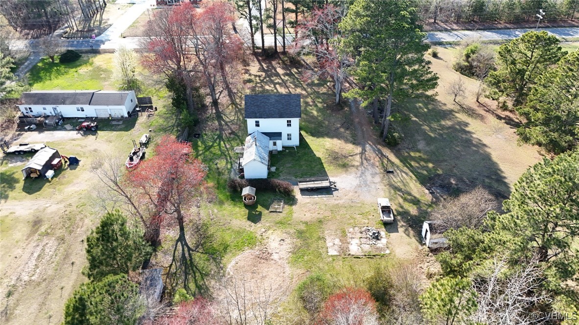 2307 New Point Comfort Highway Mathews, VA 23109 - Photo 8 of 20 an aerial view of a house with yard swimming pool and outdoor seating