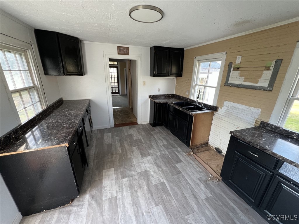 2307 New Point Comfort Highway Mathews, VA 23109 - Photo 10 of 20 a kitchen with a stove and a microwave