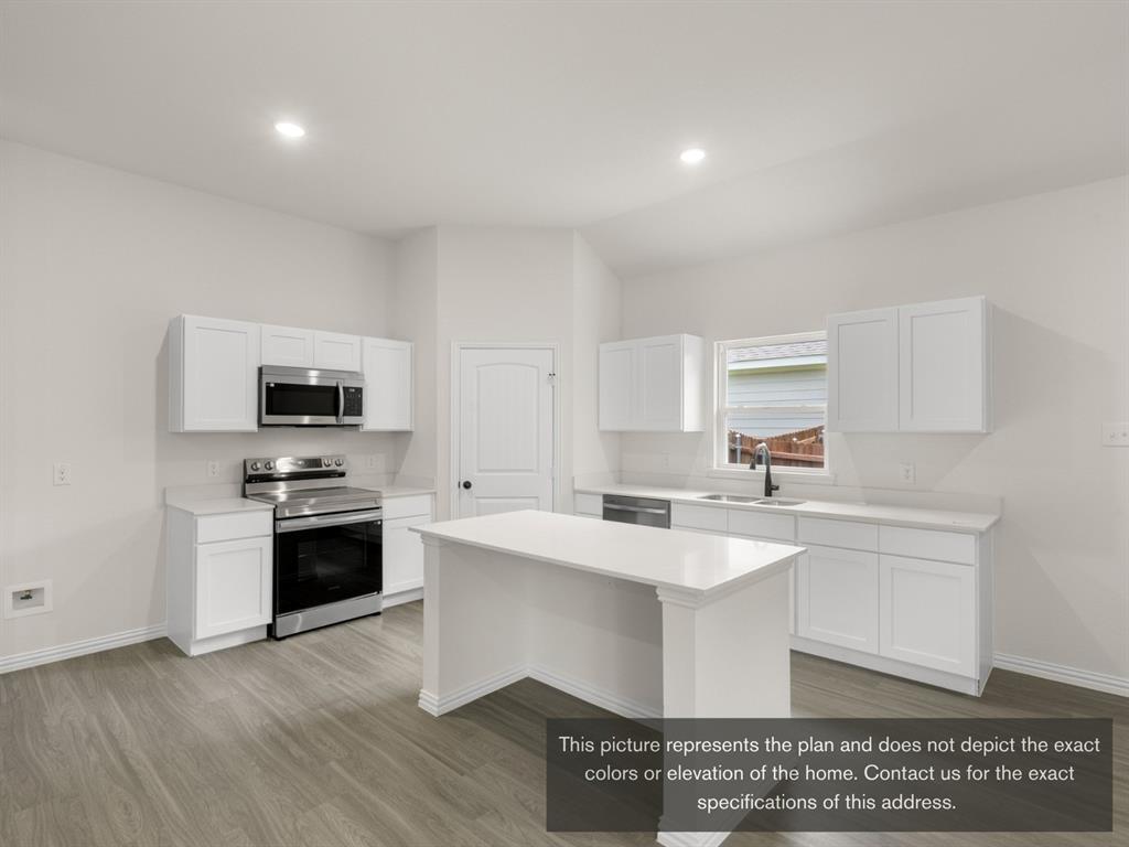 1813 Zelvia Lane Waco, TX 76708 - Photo 10 of 24 a kitchen with stainless steel appliances granite countertop a sink dishwasher stove top oven and refrigerator