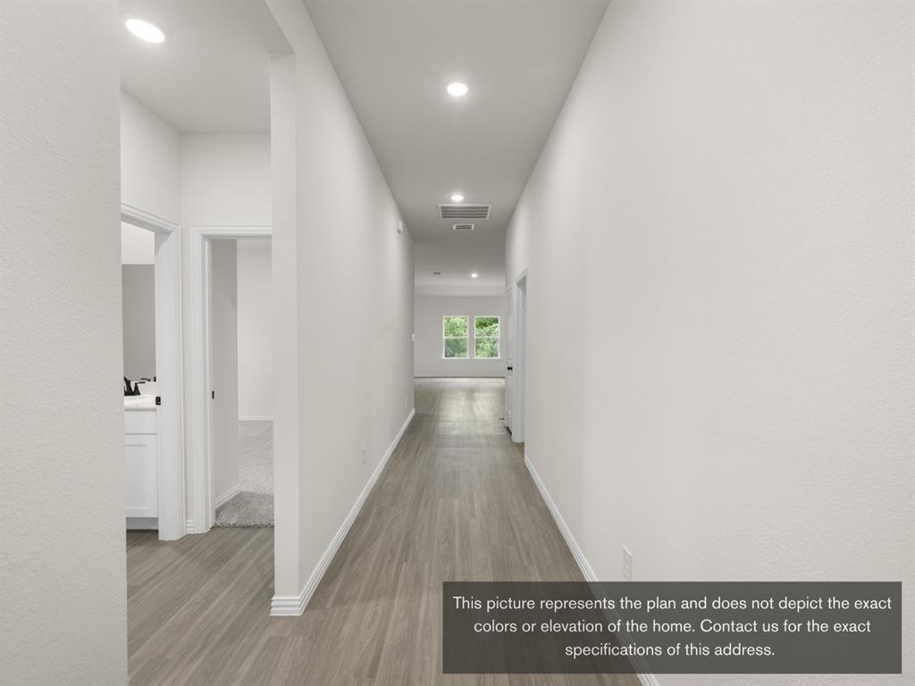 1813 Zelvia Lane Waco, TX 76708 - Photo 22 of 24 a view of hallway with wooden floor