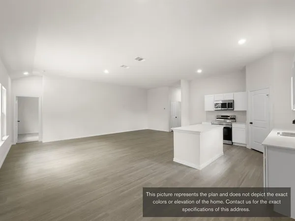a view of kitchen with wooden floor