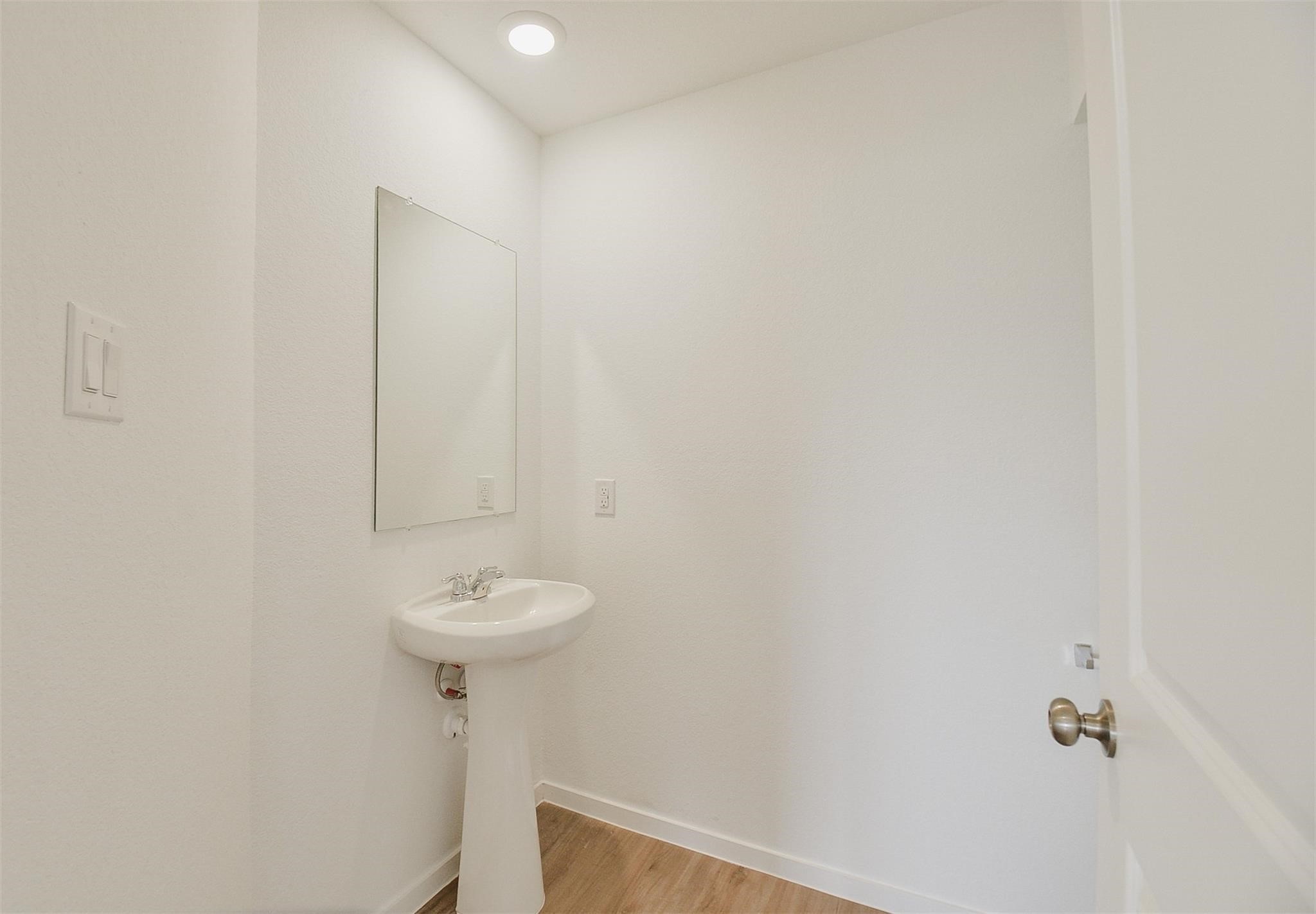 18566 Cepagatti Drive New Caney, TX 77357 - Photo 14 of 35 a bathroom with a sink