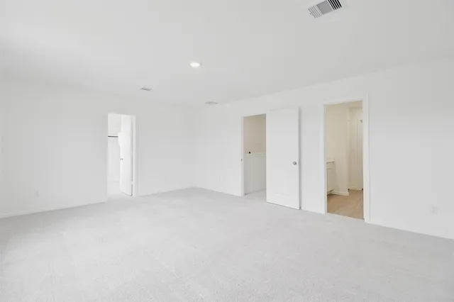 a bathroom with a sink and vanity
