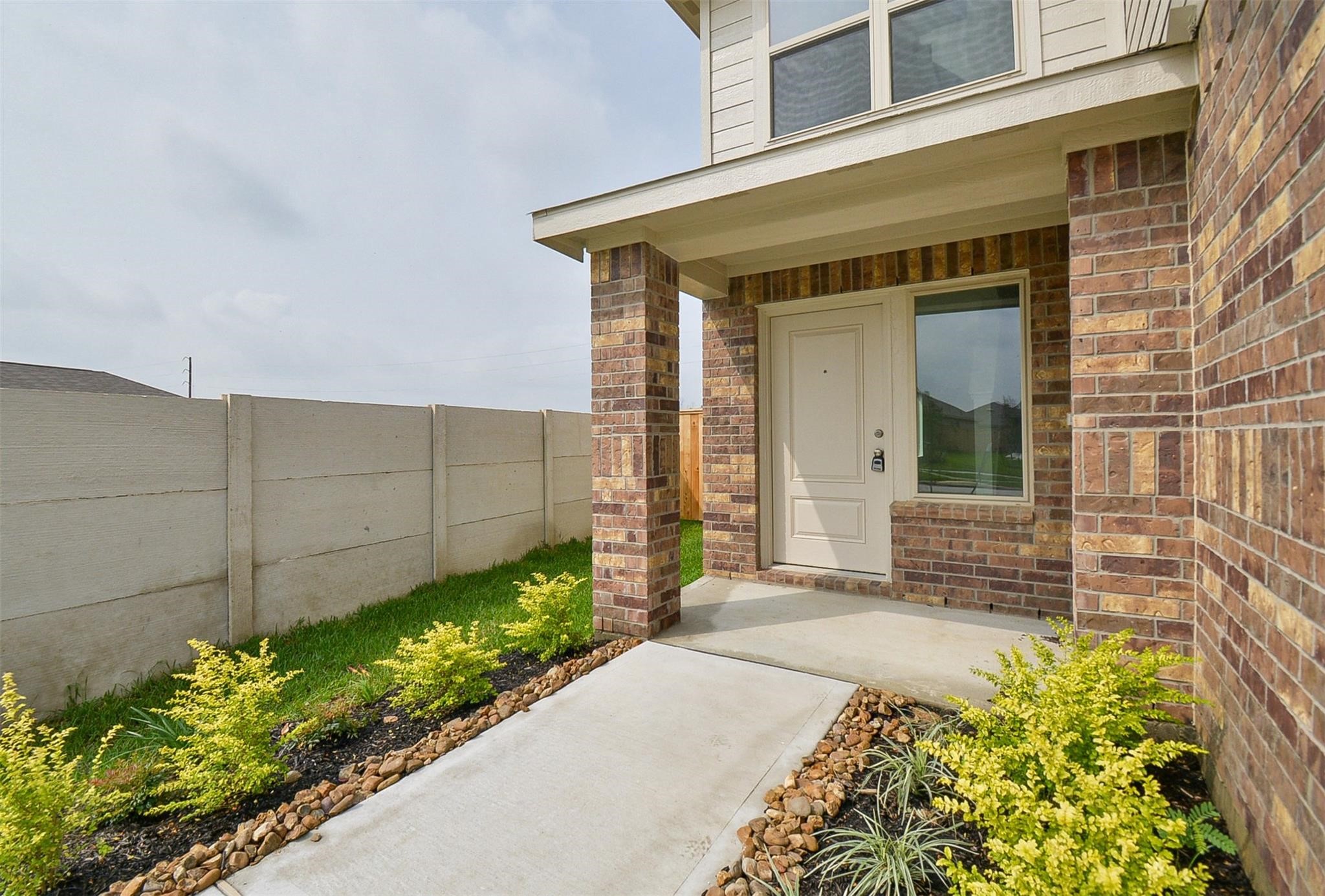 18566 Cepagatti Drive New Caney, TX 77357 - Photo 2 of 35 a front view of a house