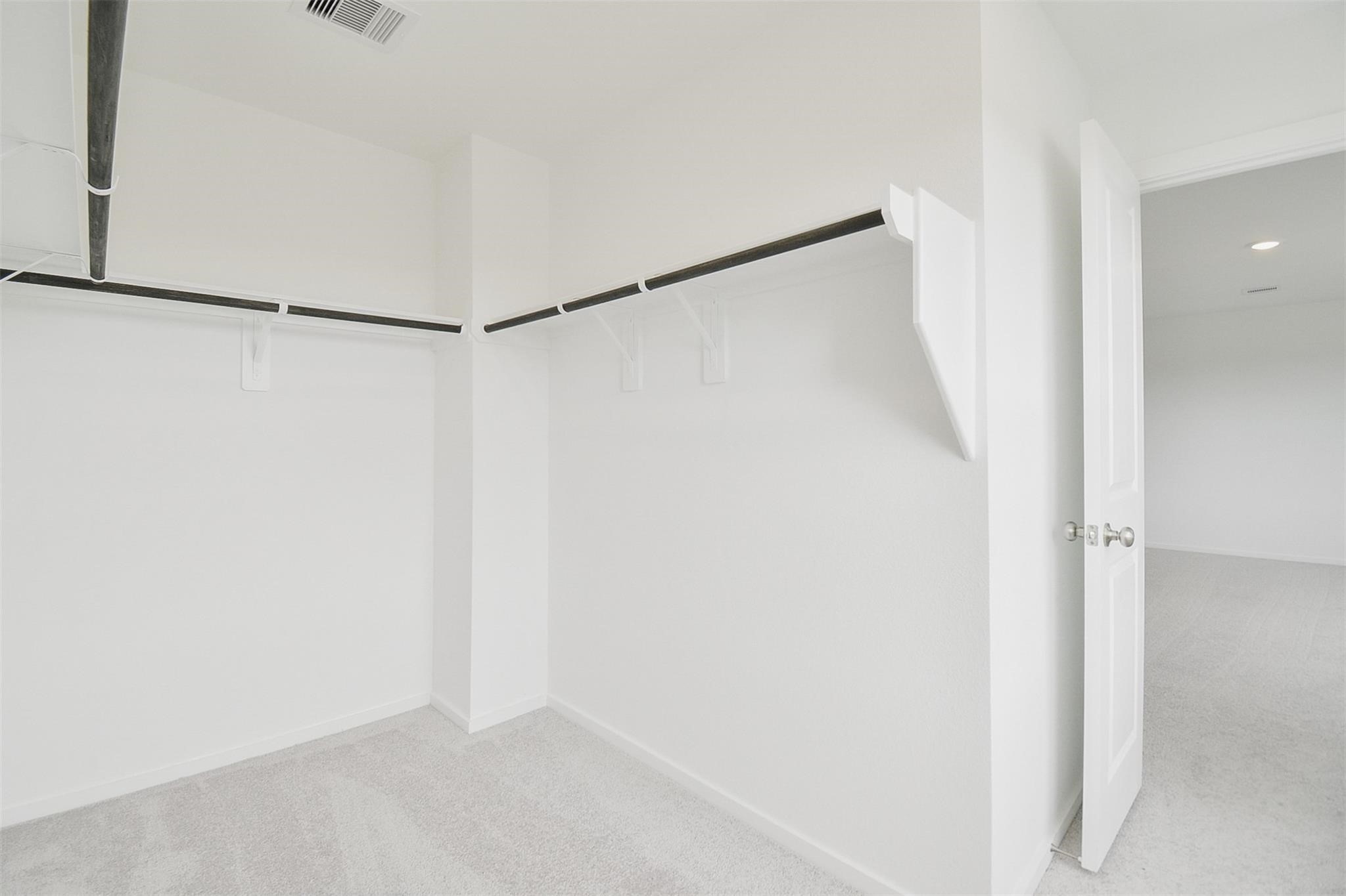 18566 Cepagatti Drive New Caney, TX 77357 - Photo 24 of 35 a view of small space with empty racks