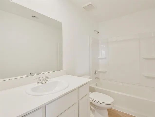 a view of a garden with a chair