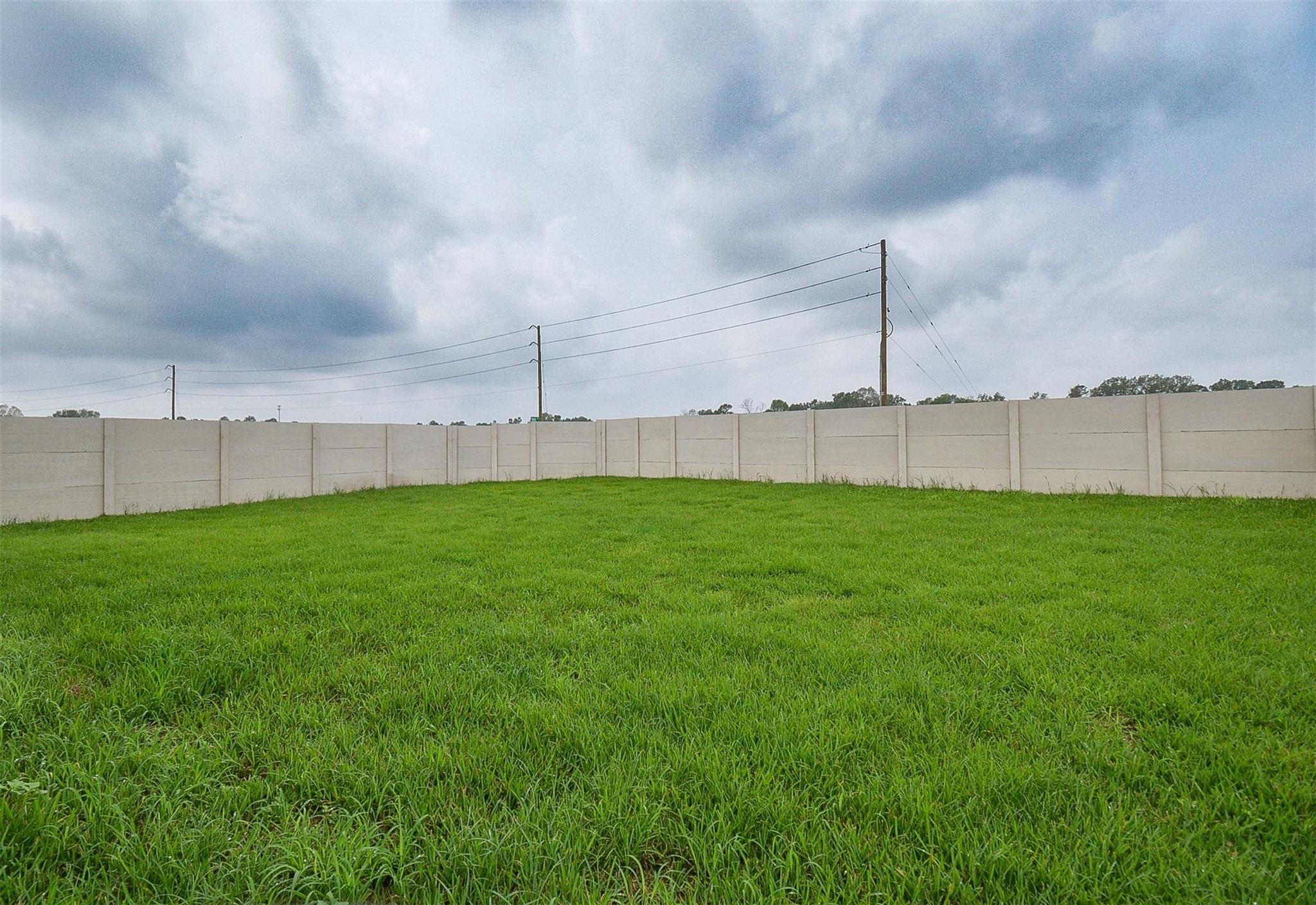 18566 Cepagatti Drive New Caney, TX 77357 - Photo 34 of 35 a view of a garden with a chair