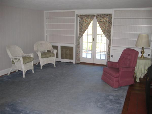 93 Argilla Road Andover, MA 01810 - Photo 22 of 28 a living room with furniture and a window