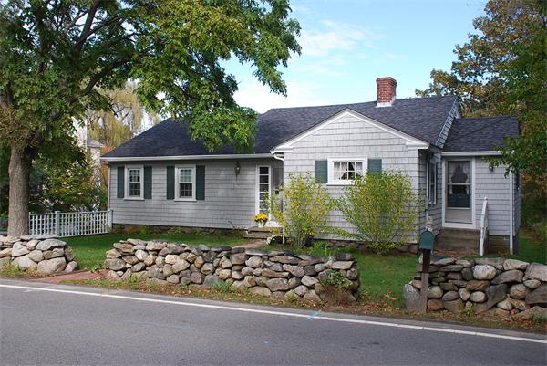 93 Argilla Road Andover, MA 01810 - Photo 27 of 28 front view of a house with a small yard
