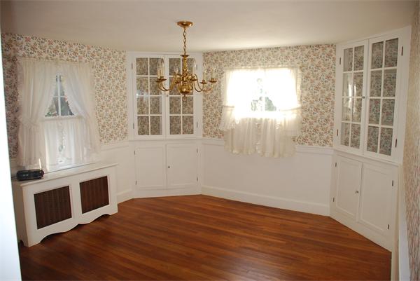 93 Argilla Road Andover, MA 01810 - Photo 4 of 28 an empty room with wooden floor and windows