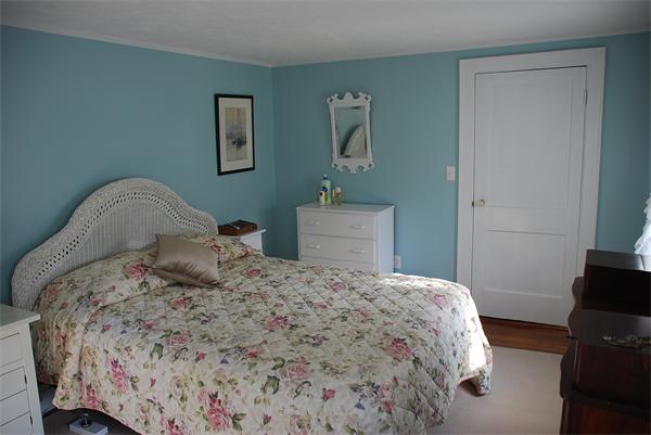 93 Argilla Road Andover, MA 01810 - Photo 7 of 28 a bedroom with a bed and chair in it