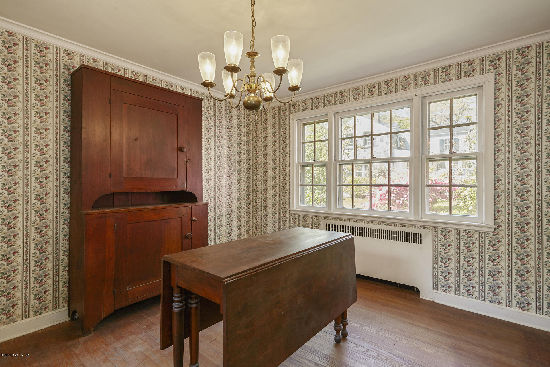 10 Hendrie Lane Riverside, CT 06878 - Photo 5 of 28 a dining room with a table and chairs