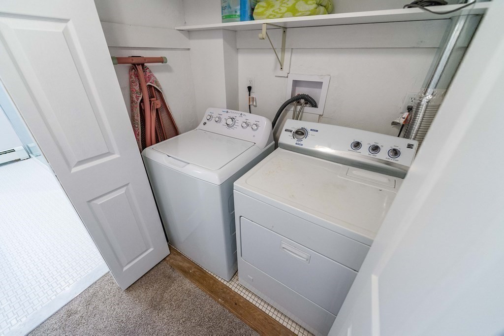71 Waldeck Road Milton, MA 02186 - Photo 15 of 27 a utility room with dryer and washer