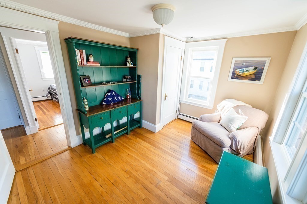 71 Waldeck Road Milton, MA 02186 - Photo 17 of 27 a living room with furniture