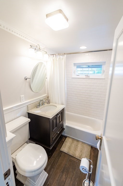 71 Waldeck Road Milton, MA 02186 - Photo 20 of 27 a bathroom with a sink toilet and shower