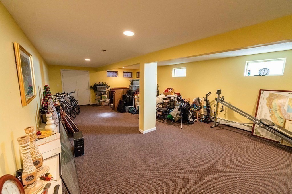 71 Waldeck Road Milton, MA 02186 - Photo 23 of 27 a view of a room with gym equipment