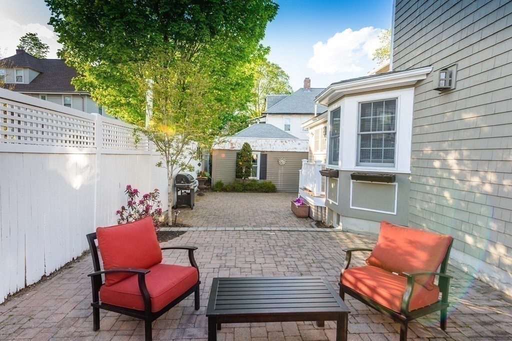 71 Waldeck Road Milton, MA 02186 - Photo 24 of 27 a building outdoor space with patio furniture
