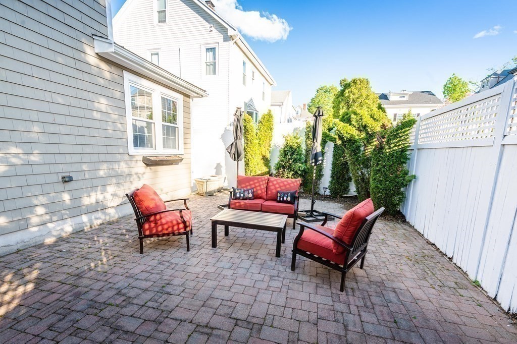 71 Waldeck Road Milton, MA 02186 - Photo 26 of 27 a outdoor space with patio couch and a table