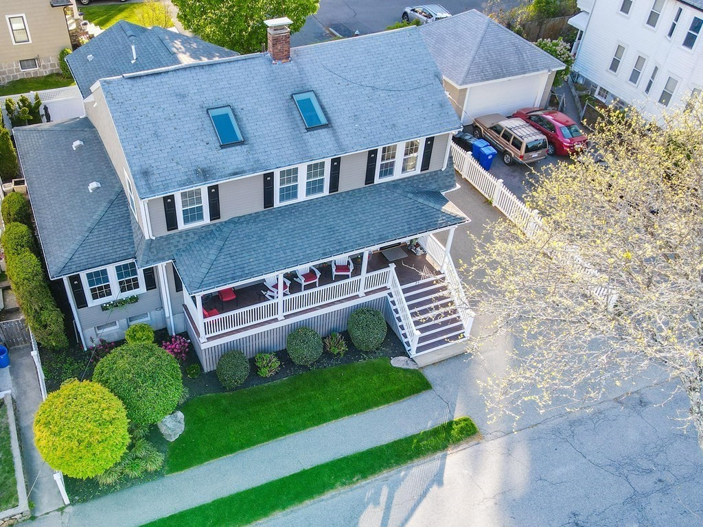 71 Waldeck Road Milton, MA 02186 - Photo 27 of 27 a aerial view of a house with a yard