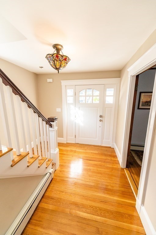 71 Waldeck Road Milton, MA 02186 - Photo 4 of 27 a view of an empty room with a window