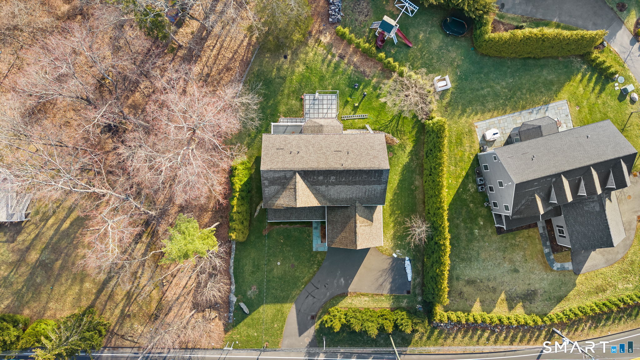 1049 Stillwater Road Stamford, CT 06902 - Photo 2 of 34 view of a house with a yard