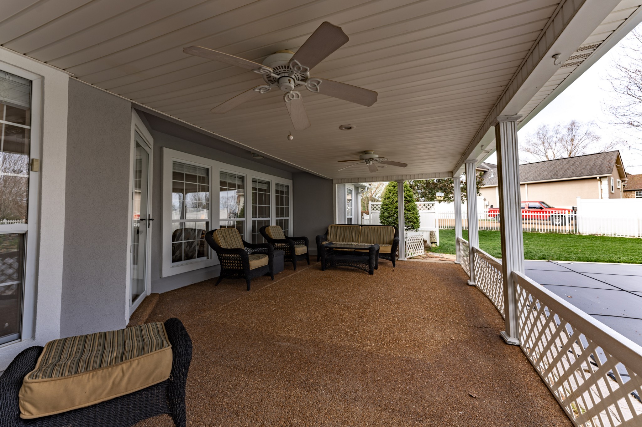 1243 Hunters Point Lane Spring Hill, TN 37174 - Photo 14 of 35 a view of a porch with chairs and backyard