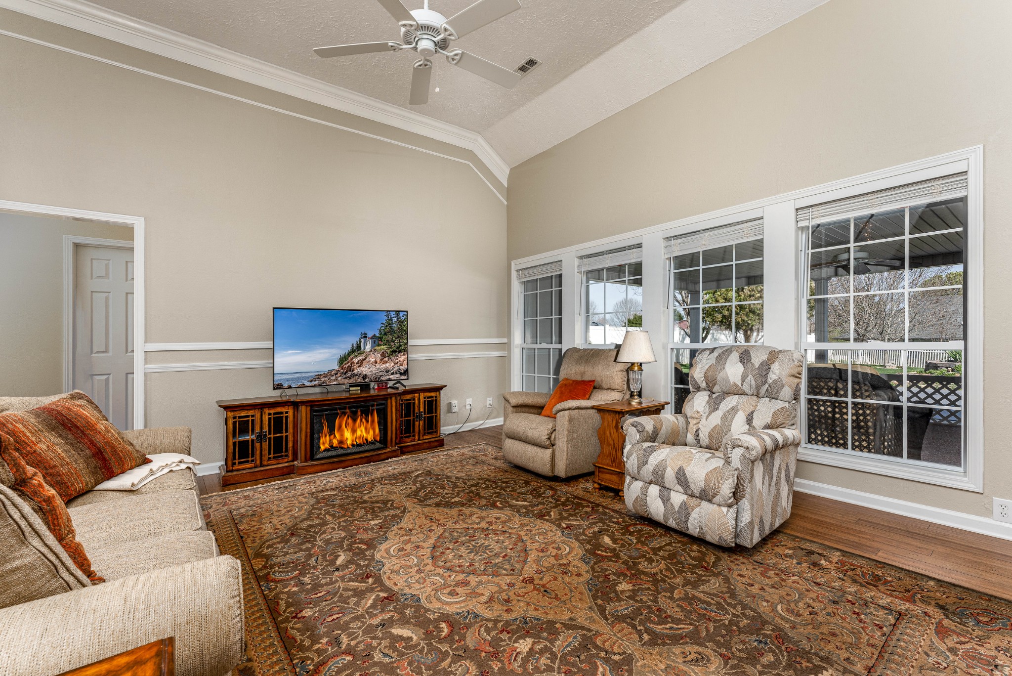 1243 Hunters Point Lane Spring Hill, TN 37174 - Photo 24 of 35 a living room with furniture and a fireplace