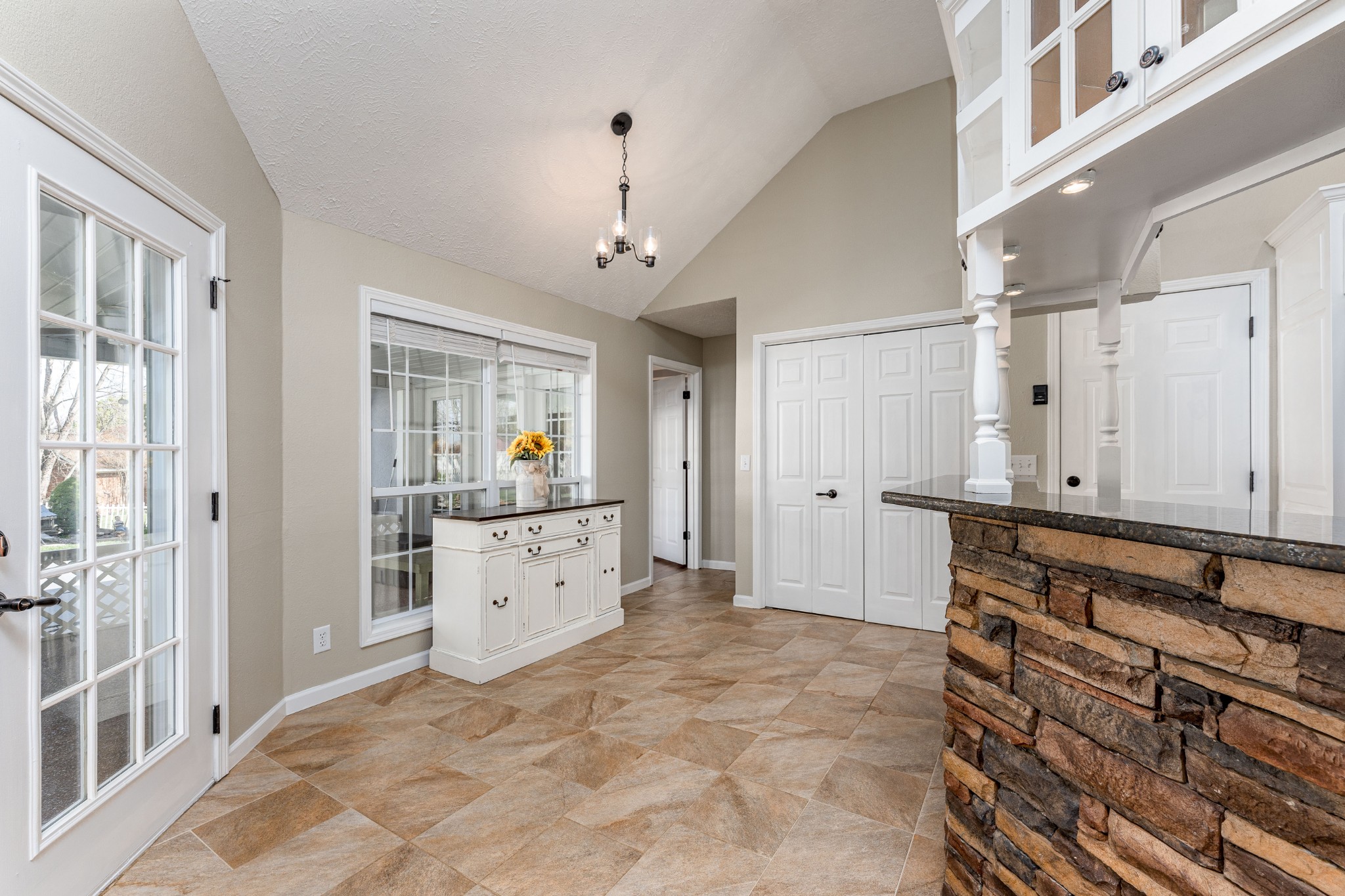 1243 Hunters Point Lane Spring Hill, TN 37174 - Photo 25 of 35 a view of a kitchen with refrigerator and window