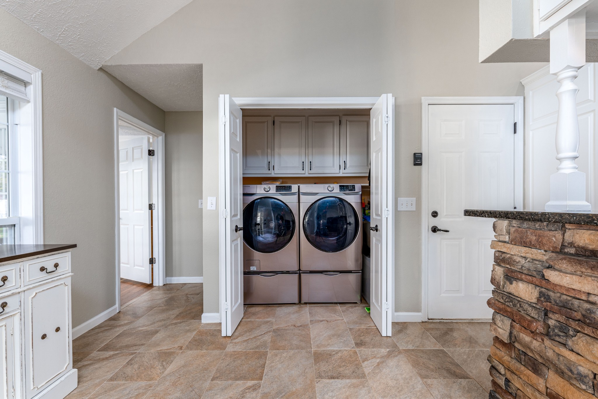 1243 Hunters Point Lane Spring Hill, TN 37174 - Photo 28 of 35 a view of a storage & utility room with washer and dryer