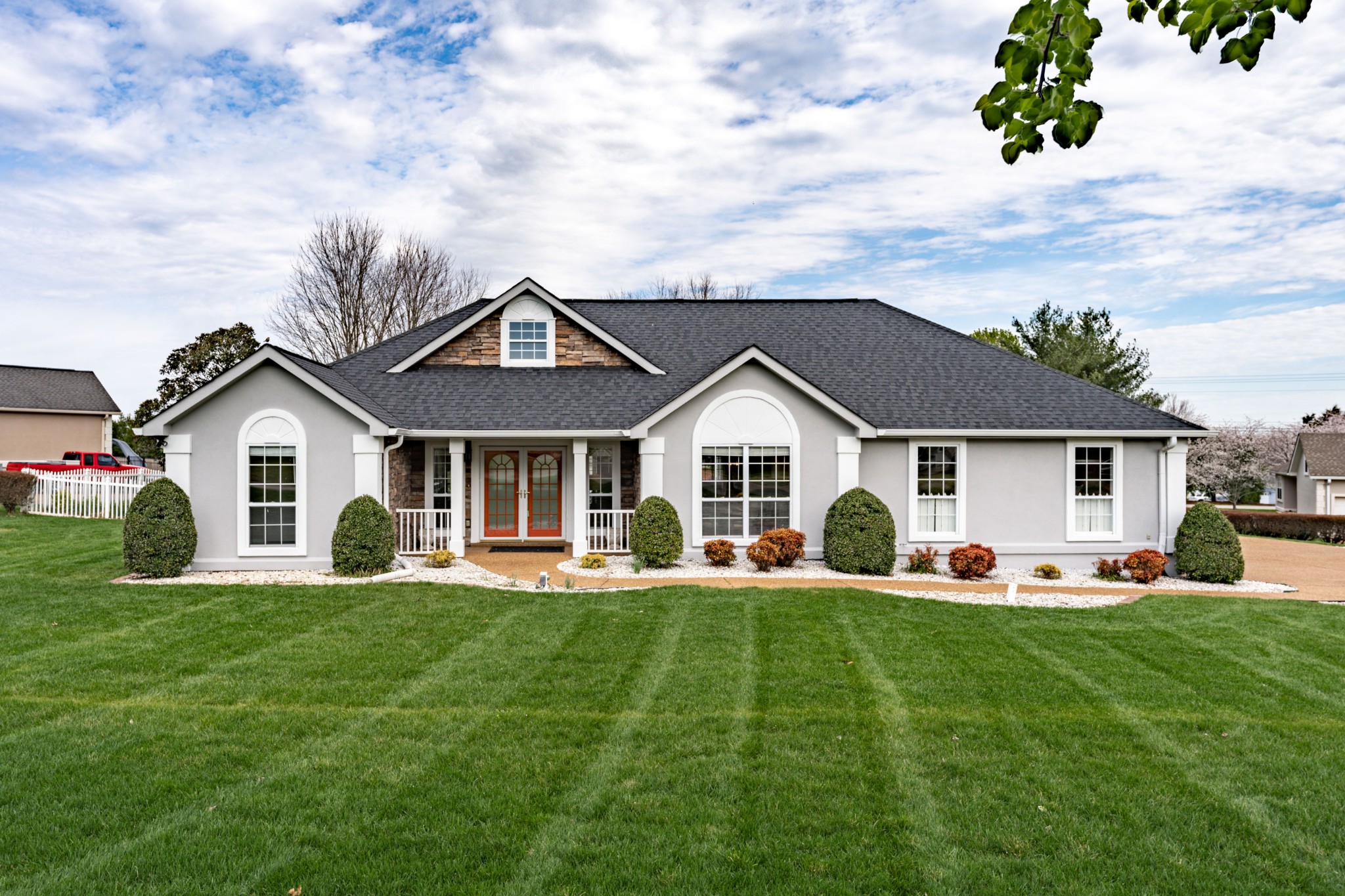 1243 Hunters Point Lane Spring Hill, TN 37174 - Photo 3 of 35 a front view of a house with a yard