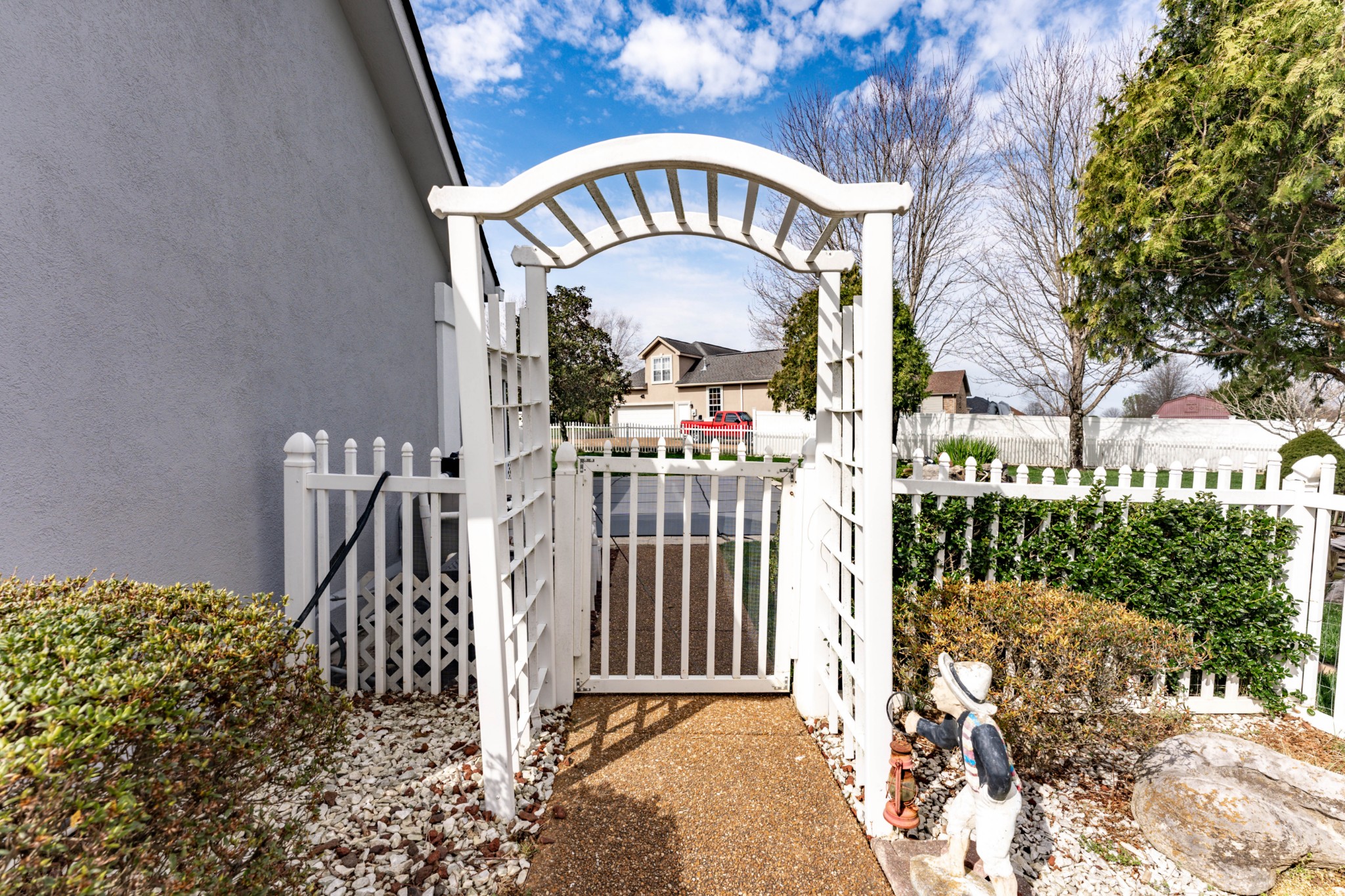 1243 Hunters Point Lane Spring Hill, TN 37174 - Photo 7 of 35 a view of a entrance gate of a house