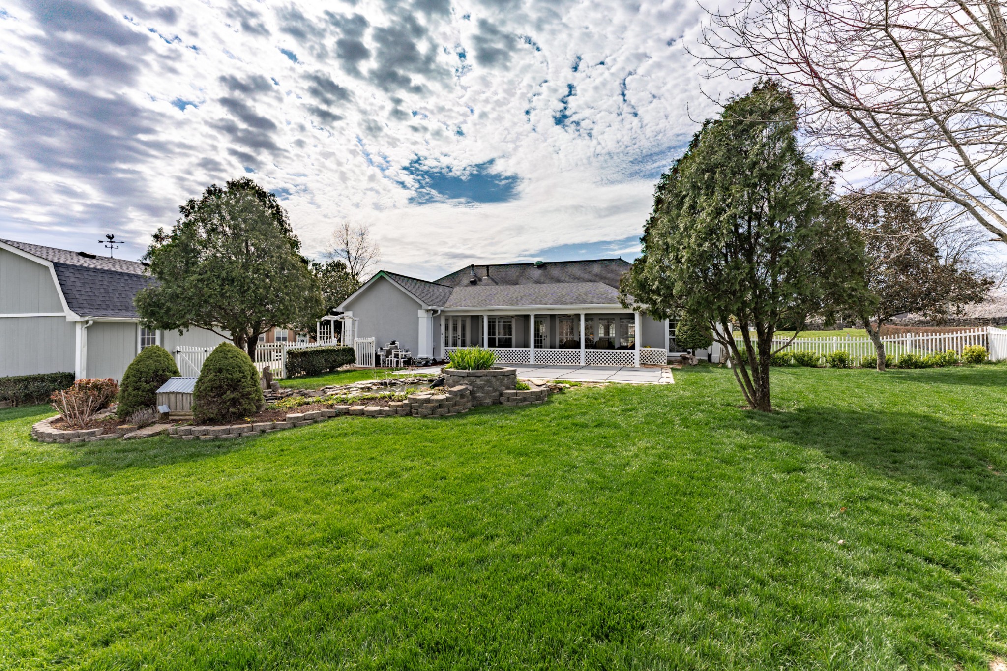 1243 Hunters Point Lane Spring Hill, TN 37174 - Photo 10 of 35 a front view of a house with yard patio and green space