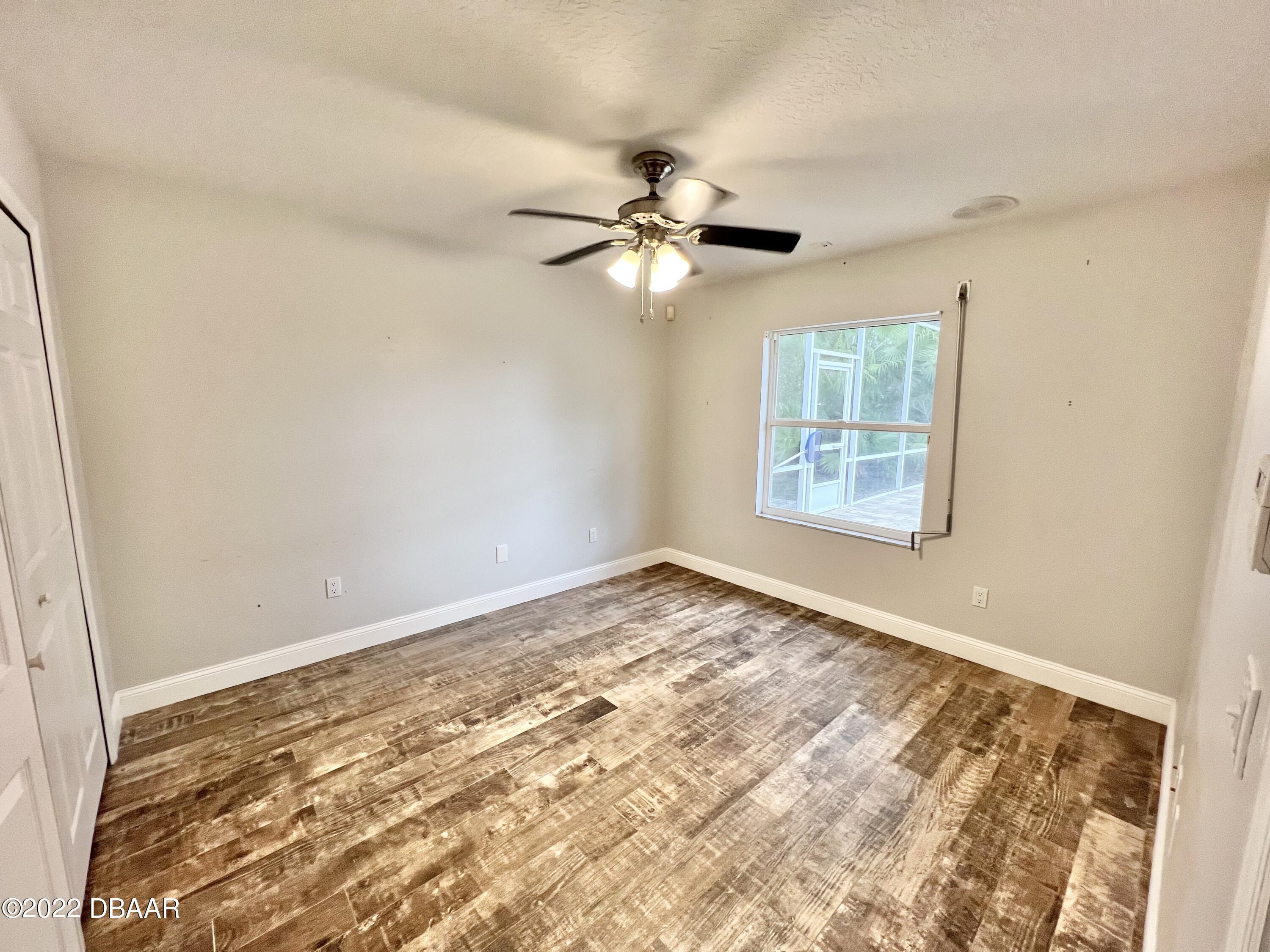 75 Creek Bluff Way Ormond Beach, FL 32174 - Photo 16 of 20 en view of an empty room with a window