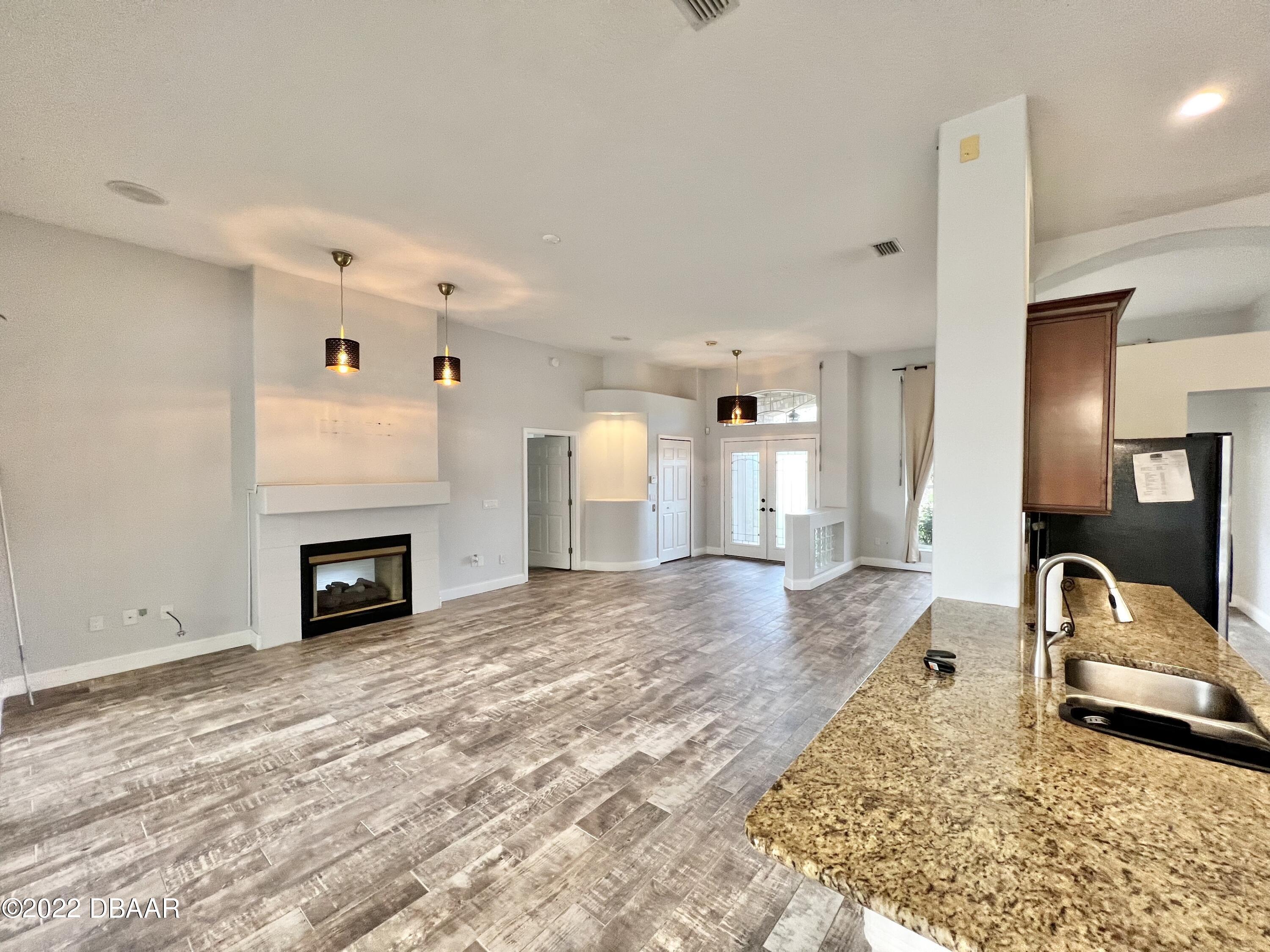 75 Creek Bluff Way Ormond Beach, FL 32174 - Photo 5 of 20 a large white bed in a white room