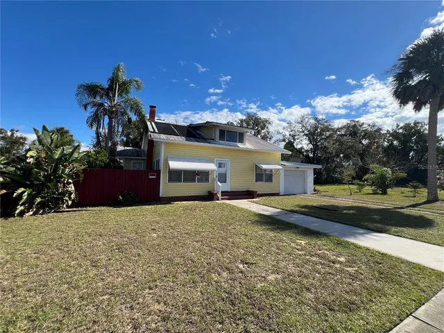 a house view with a garden space