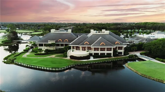 an aerial view of a house with outdoor space