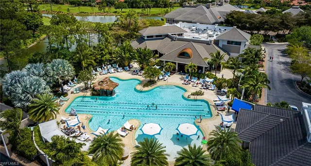 a view of a swimming pool with a patio