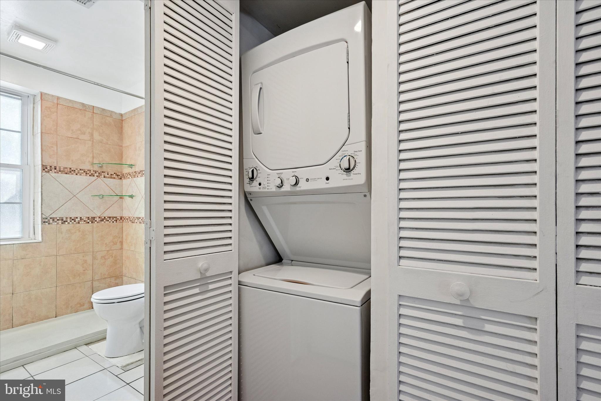42 Conshohocken State Road, Unit 7B Bala Cynwyd, PA 19004 - Photo 11 of 13 a bathroom with a toilet and a shower