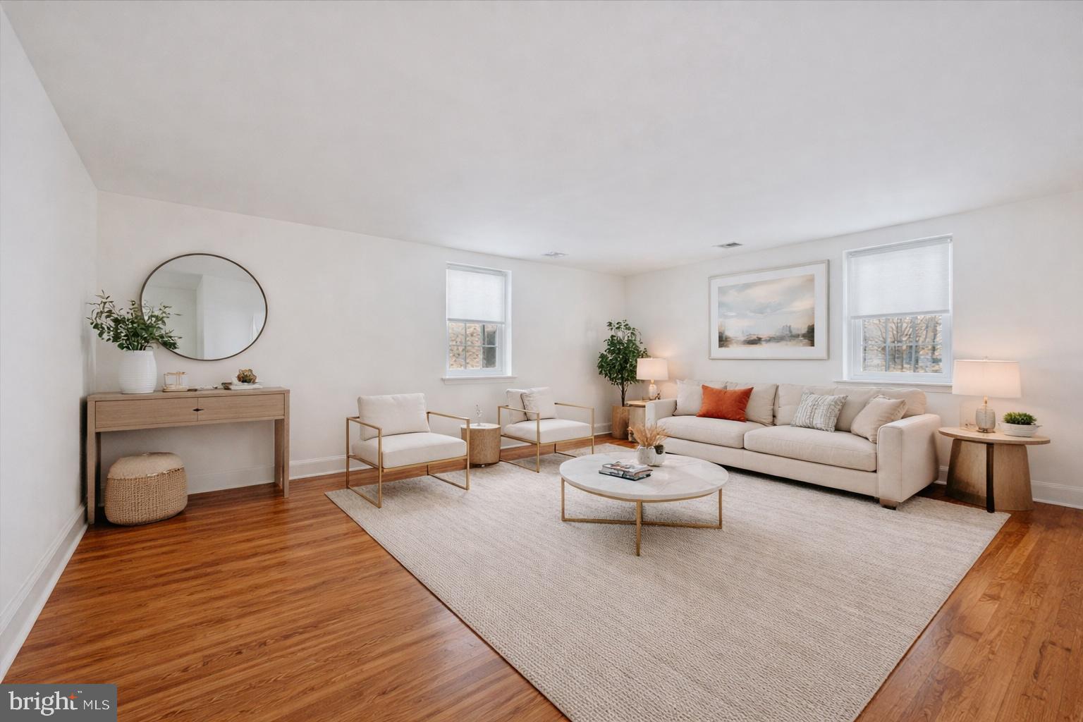 42 Conshohocken State Road, Unit 7B Bala Cynwyd, PA 19004 - Photo 7 of 13 a living room with furniture and a couch