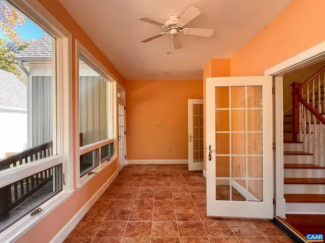 a stove top oven sitting inside of a kitchen