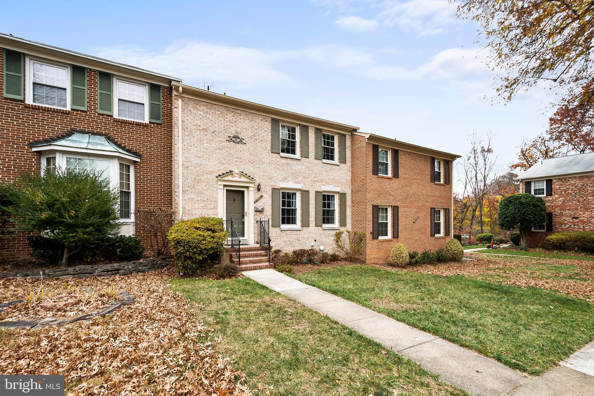 9518 Hunt Square Court Springfield, VA 22153 - Photo 1 of 39 a front view of a house with a yard