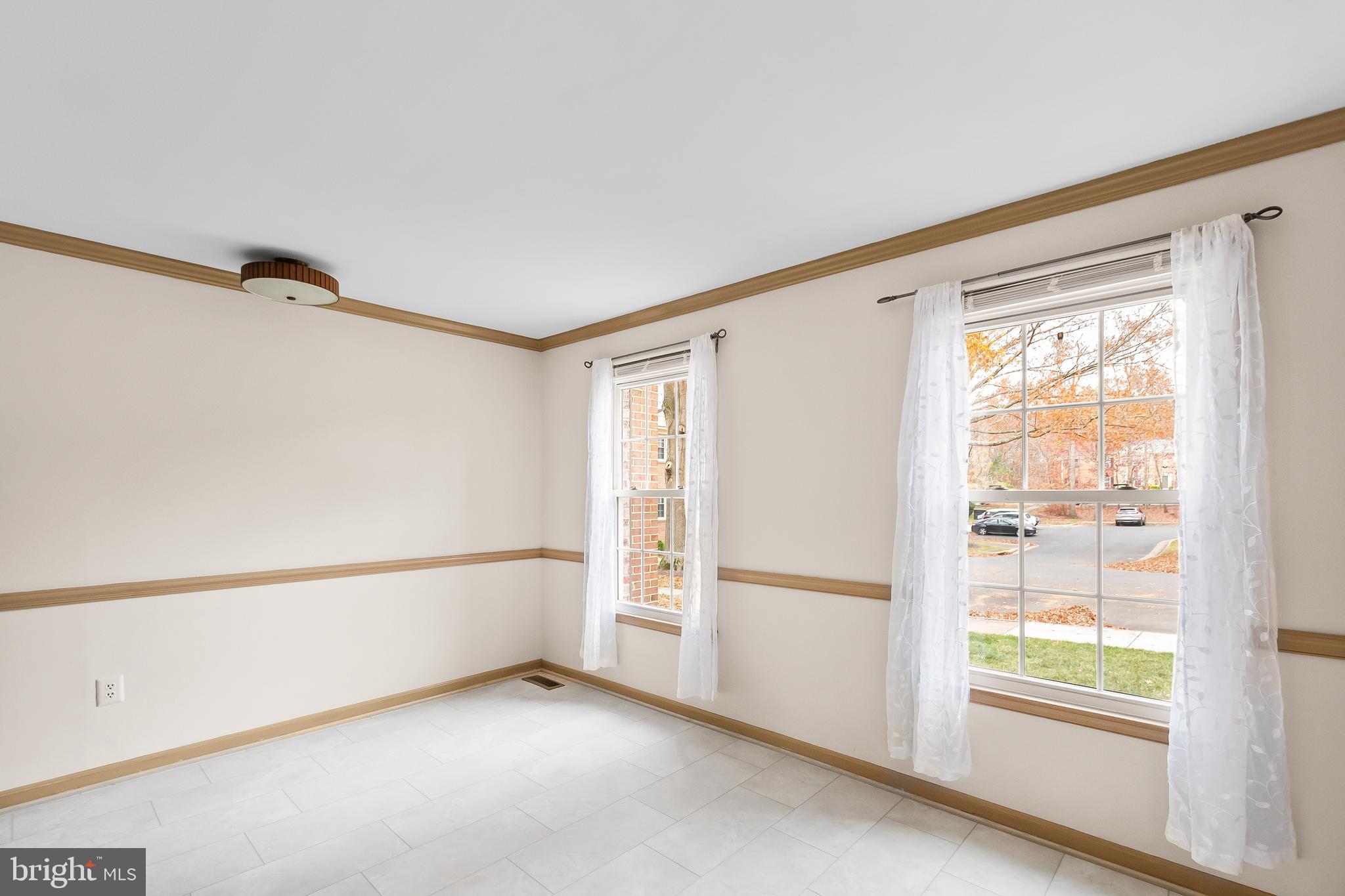 9518 Hunt Square Court Springfield, VA 22153 - Photo 14 of 39 a view of an empty room with a window