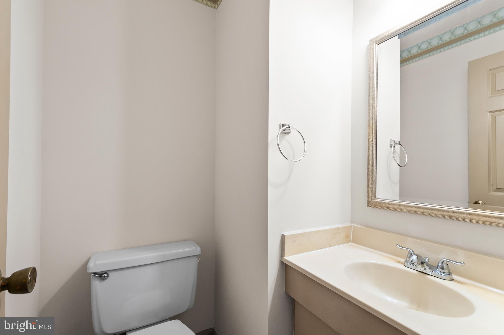 9518 Hunt Square Court Springfield, VA 22153 - Photo 19 of 39 a bathroom with a sink toilet and shower