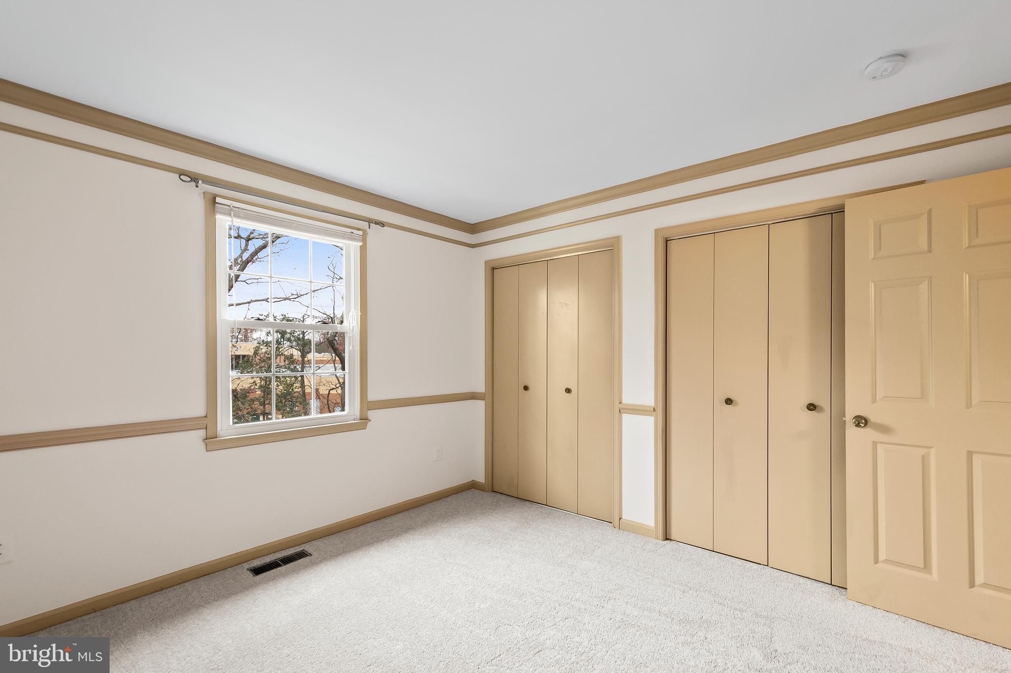 9518 Hunt Square Court Springfield, VA 22153 - Photo 23 of 39 a view of an empty room with a window