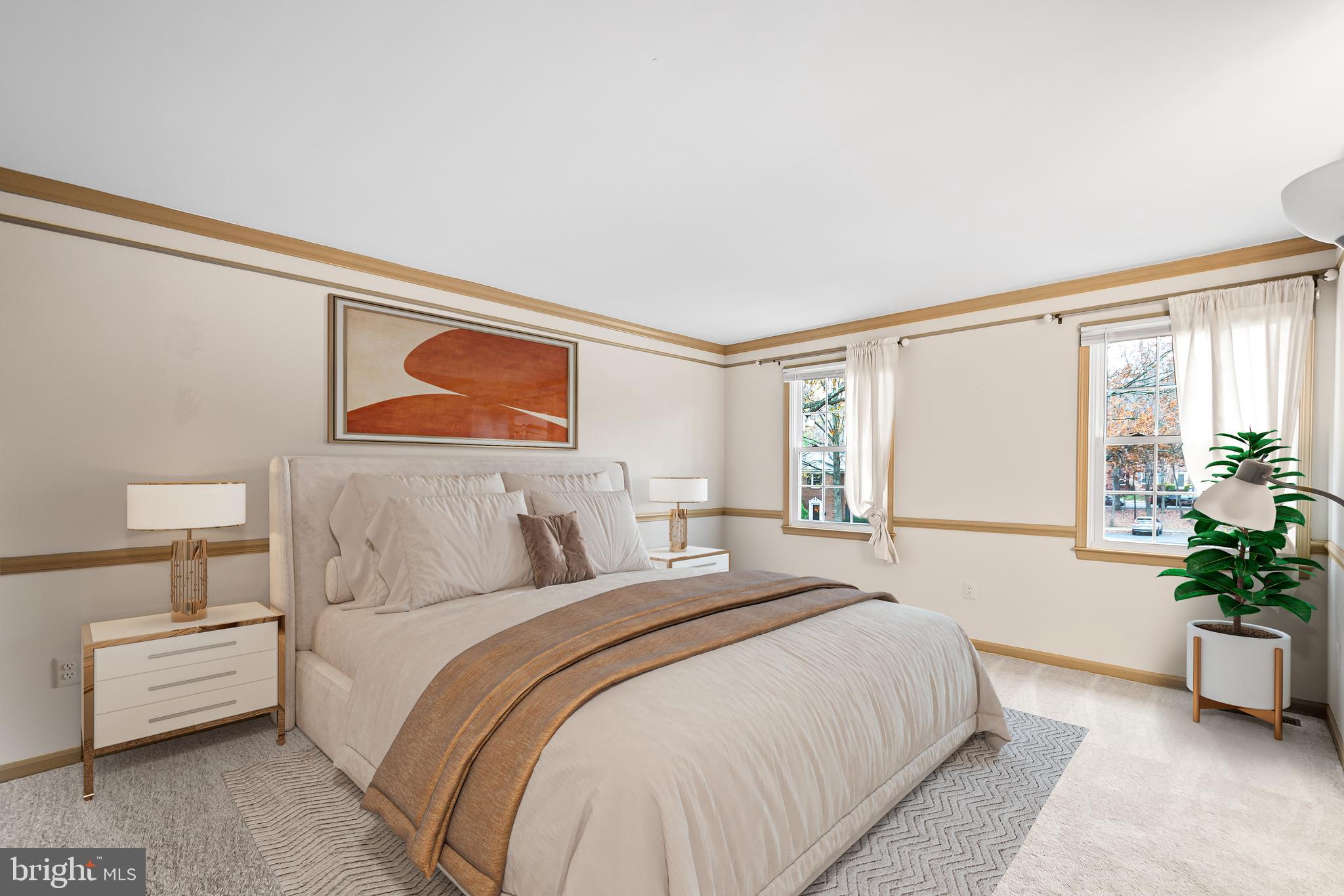 9518 Hunt Square Court Springfield, VA 22153 - Photo 25 of 39 a bedroom with a large bed and potted plant